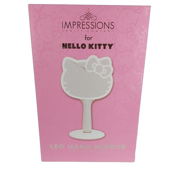 Hello Kitty Makeup Impressions Hello Kitty Led Handheld Makeup Mirror With Standing Base